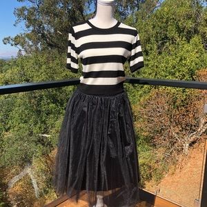 Black tulle midi length tutu/skirt, lined.